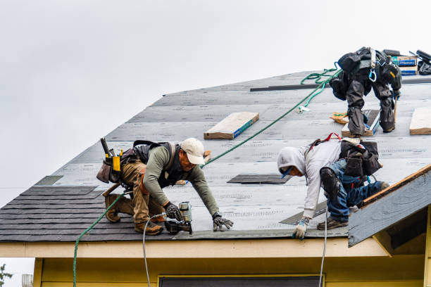 Professional Gutter Installation technician working in Bedford, IN